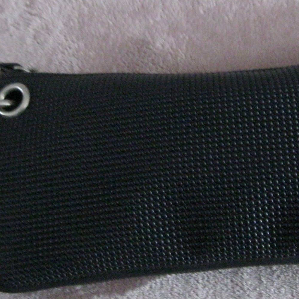 "VINTAGE CLUTCH PURSE MADE FROM OLD BLACK TIRES-LOTS OF STORAGE SPACE INSIDE"